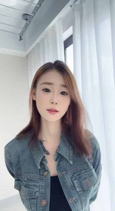 A pretty, big-breasted female school beauty with very firm, white, and